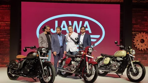 The three Jawa Motorcycles on stage at the launch with M&M Chairman Anand Mahindra (second from left). (Source: BloombergQuint)