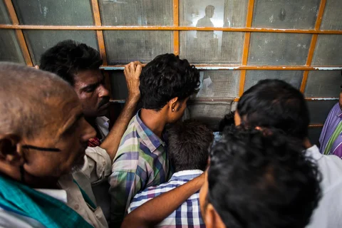 Patients queue to receive test results at the Acharya Tulsi Regional Cancer Treatment & Research Institute in Bikaner, Rajasthan. (Photographer: Prashanth Vishwanathan/Bloomberg)