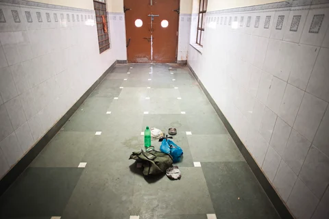 Personal belongings of a patient’s relative sit in a corridor at a hospital in Bikaner, Rajasthan. (Photographer: Prashanth Vishwanathan/Bloomberg)