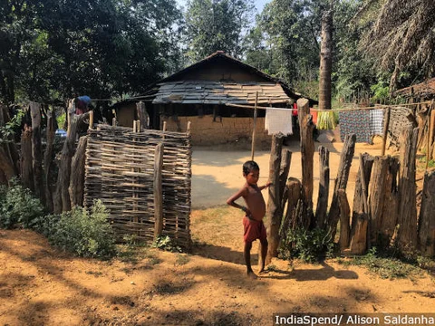 A child of the Gond tribe outside her home in Badrimau village, in Maoist-affected Bastar district, southern Chhattisgarh. Many villagers received forest titles without applying, but in the absence of government services and development, land titles and elections mean nothing, locals say.