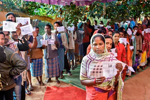 Voters wait in queues to cast their votes at a polling station in Narayanpur, Chhattisgarh, on Nov. 12,2018. (Photograph: PTI)