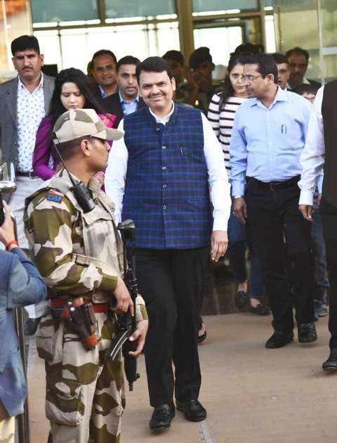 Maharshtra’s Chief Minister Devendra Fadnavis arrives at the Udaipur airport for the Isha Ambani-Anand Piramal pre-wedding celebrations. (Photo: Yogen Shah, The Quint)