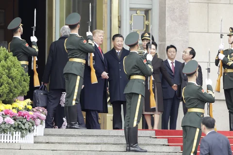 Donald Trump and Xi Jinping outside the Great Hall of the People in Beijing, China. (Photographer: Qilai Shen/Bloomberg)