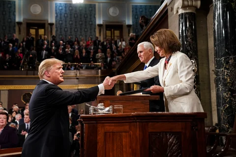 U.S. President Donald Trump shakes hands with U.S. House Speaker Nancy Pelosi, in Wasthington D.C., on Feb. 5, 2019. (Photographer: Doug Mills/Pool via Bloomberg)