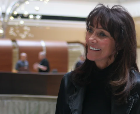 Diane Hendricks, chief executive officer of ABC Supply Co., smiles during a company meeting at a hotel in Rosemont, Illinois, U.S. (Photographer: John McCormick/Bloomberg)