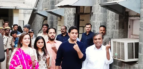 The Ambanis after casting their vote at Villa Theresa High School on Peddar Road. (Source: BloombergQuint)