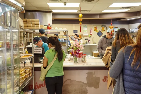 Lines form at Banh Mi Saigon’s newer, slightly more spacious location. 