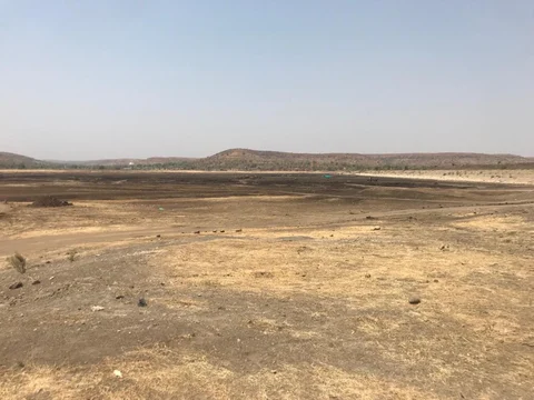 The bed of Bodhegaon reservoir which now looks like a playground. (Source: BloombergQuint)