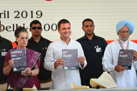 Rahul Gandhi, Sonia Gandhi, and Manmohan Singh release the Congress manifesto, in New Delhi (Photograph: PTI)