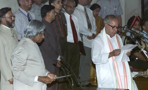 Pranab Mukherjee is adminstered the oath of office by President APJ Abdul Kalam, on May 22, 2004. (Photograph: PIB)