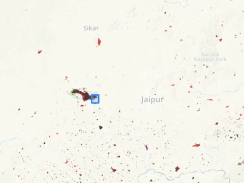 Satellite data on the changes in surface water in and around Jaipur show that several water bodies have either dried out or shrunk in size. In the centre, in blue box, is the 190 sq km of the Sambhar lake. The red indicates water bodies that have reduced in size, while green indicates an increase in the amount of water. Black indicates that the water bodies are the same size. Source: <a href="https://noah-water.appspot.com/">NOAH</a>, an application that shows changes in rainfall and surface water using satellite data.