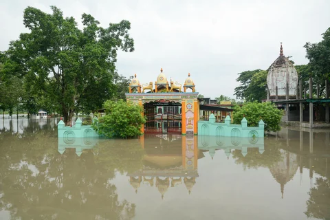 A temple is seen half submerged under flood waters, following heavy monsoon rain, in Kamrup district (Source: PTI)