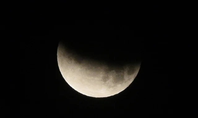 Partial Lunar Eclipse, as seen in the skies of Surat on Tuesday