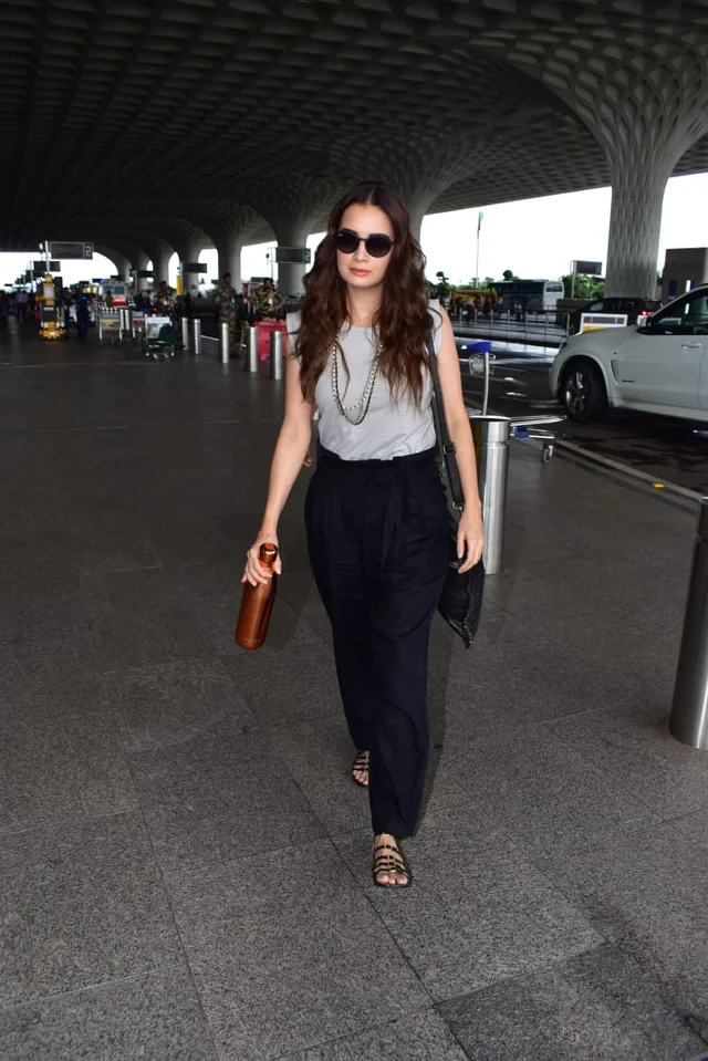 Dia Mirza spotted by shutterbugs at Mumbai airport.