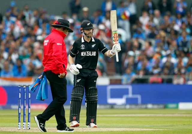New Zealand's batsman Kane Williamson celebrates his half century during the Semi Final match against India at Old Trafford in Manchester on Tuesday.