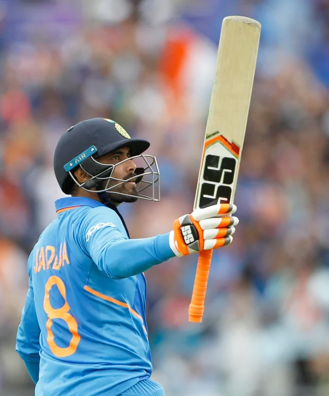 Indian batsman Ravindra Jadeja celebrates his half century during the Semi Final match against New Zealand during ICC CWC 2019 at Old Trafford in Manchester on Wednesday.