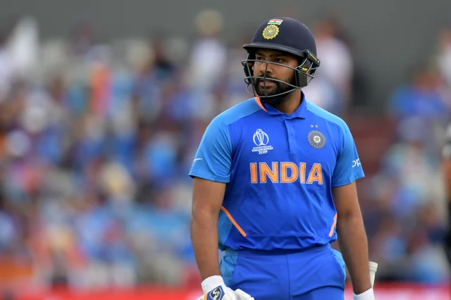 India's Rohit Sharma walks off for one during the 2019 Cricket World Cup first semi-final between New Zealand and India at Old Trafford in Manchester, northwest England, on July 10, 2019