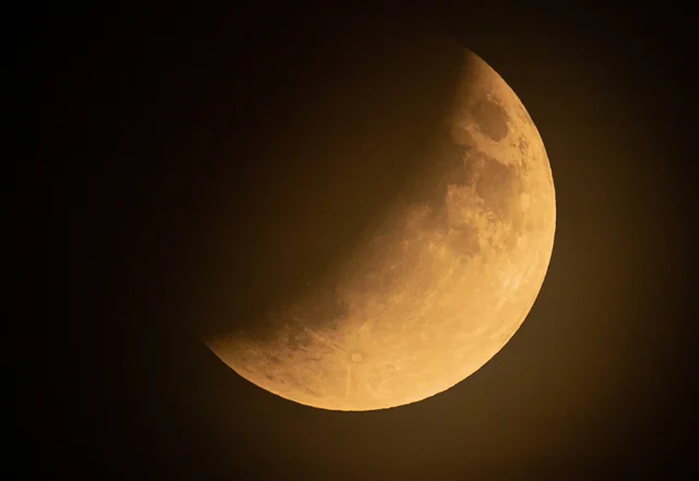 The moon is seen during a partial lunar eclipse in Baden-Baden, Germany, on July 16, 2019.