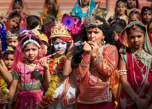 Students dressed up as Lord Krishna and Radha take part in 'Janmashtami' festival celebrations, in Ajmer