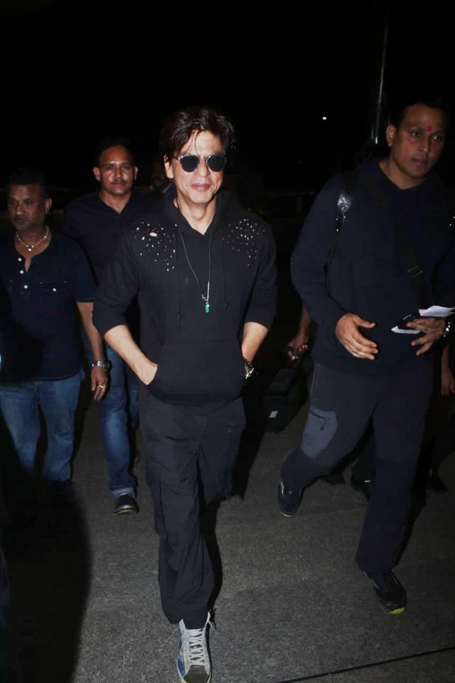 Shah Rukh Khan was spotted at the airport by the shutterbugs. He was all smiles to lenses in black casual attire.