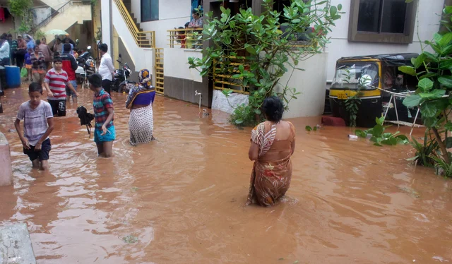 A view of a flooded area after a lake overflowed following heavy rain, in Hubballi, Karnataka, Wednesday, Aug 7, 2019.