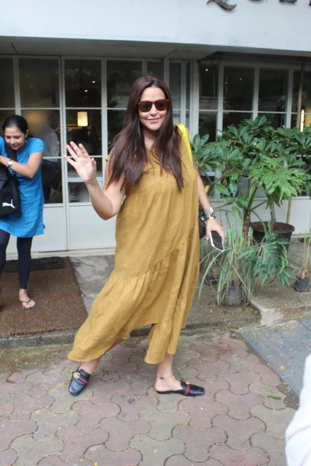 Yummy Mummy Neha Dhupia and John Abraham were spotted yesterday at Sequel in Bandra.