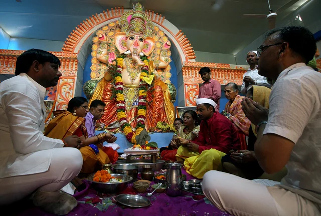 Devotees offering prayers after the installation of an idol of Lord Ganesh at Patrakarpuram Ganesh Puja Pandaal on the occasion of Ganesh Chaturthi in Lucknow