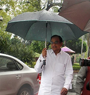 Finance Minister P Chidambaram at Parliament house in New Delhi on Tuesday during the monsoon session.