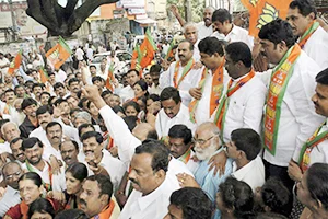 BJP leaders and workers stage a protest against Patna bomb blasts in Bengaluru on Monday.