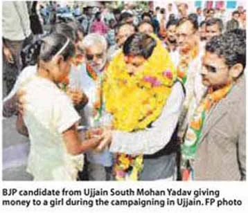 Giving cash to voters lands BJP candidate in trouble