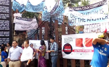 Residents’ blockade at the Campa Cola society gates on Tuesday.