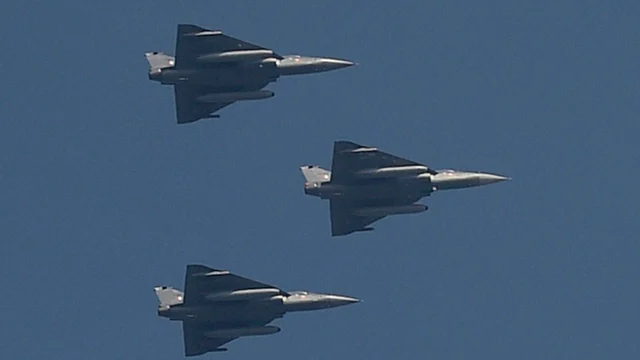 New Delhi: Indian Air Force’s Tejas planes flying past for the first time during a full dress rehearsal for the Republic Day Parade at Rajpath in New Delhi on Monday. PTI Photo by Kamal Singh