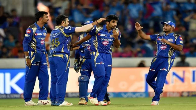 Hyderabad : Mumbai Indians Jasprit Bumrah with team mates celebrate the wicket of M S Dhoni during the IPL 10 Final match between Rising Pune Supergiants and Mumbai Indians in Hyderabad on Sunday.