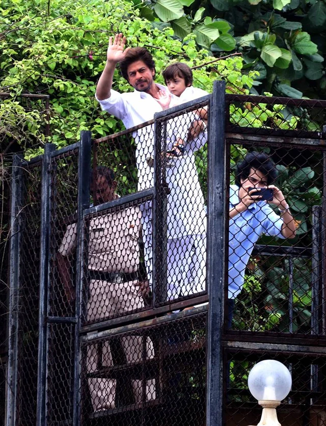 See pics: Shah Rukh Khan, AbRam greet fans outside Mannat on Eid