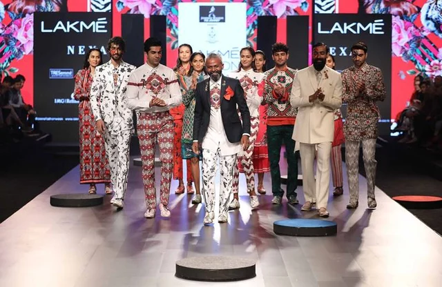 Designer Ajay Kumar with models at the Johnnie Walker presents Mr.Ajay Kumar