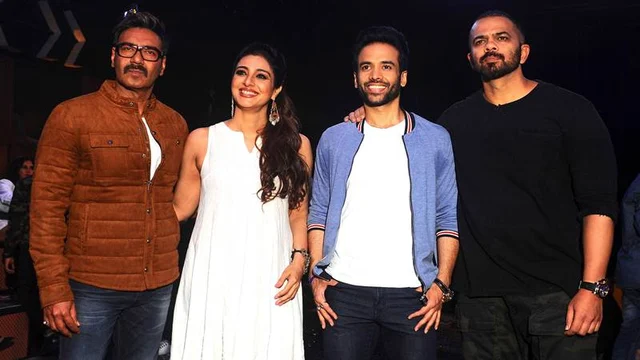 Indian Bollywood actors Ajay Devgn (L), Tabbu (2L) and Tusshar Kapoor (2R) and director Rohit Shetty pose for a photograph during a promotional event for the ‘Khatron Ke Khiladi’ reality show, based on the US format ‘Fear Factor’ in Mumbai on late September 19, 2017. / AFP PHOTO / STR