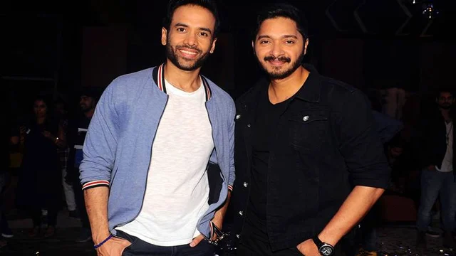 Indian Bollywood actors Tusshar Kapoor (L) and Shreyas Talpade pose for a photograph during a promotional event for the ‘Khatron Ke Khiladi’ reality show, based on the US format ‘Fear Factor’ in Mumbai on late September 19, 2017. / AFP PHOTO / STR