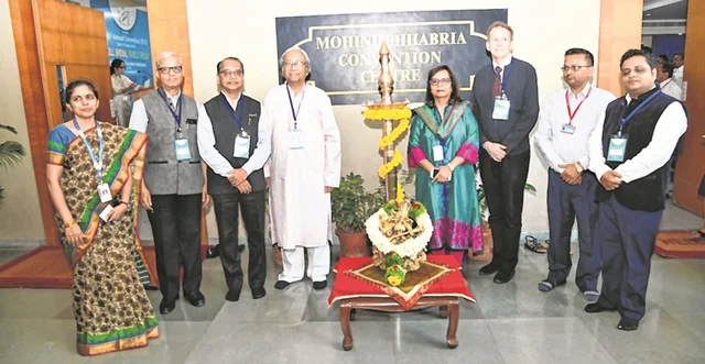Lighting of the lamp by organisers and participants of HEF