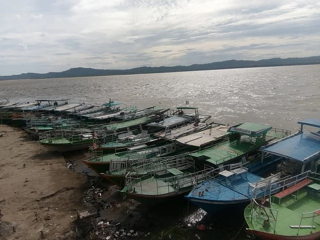 Boats lines up on the banks of the Irrawaddy River