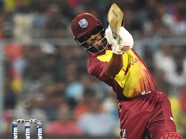 West Indies cricketer Shai Hope plays a shot during the first T20 cricket match between India and West Indies at the Eden Gardens Cricket Stadium in Kolkata on November 4, 2018. (Photo by Dibyangshu SARKAR / AFP)