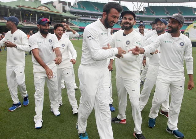 India’s cricket team celebrate their series win over Australia after play was called off on day 5. AP/PTI