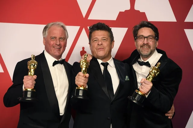 (L-R) Paul Massey, Tim Cavagin and John Casali, winners of Best Sound Mixing<br />Getty Images/AFP