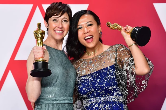 Domee Shi (R) and Becky Neiman-Cobb<br />Photo by FREDERIC J. BROWN / AFP
