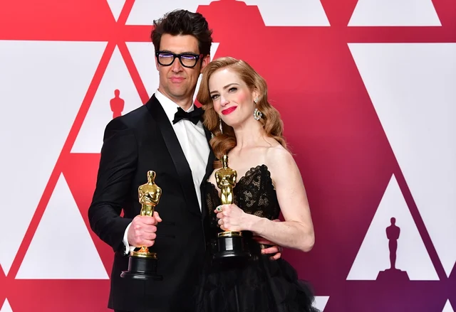 Director Guy Nattiv, and his wife actress Jaime Ray Newman Photo by FREDERIC J. BROWN / AFP