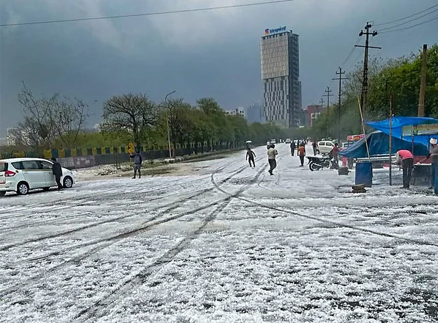 A view of a street after hailstorm struck various parts of Noida,<br />PTI Photo