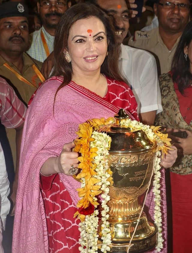 Mumbai: Mumbai Indians (MI) owner Nita Ambani holds an IPL winning trophy as she arrives at Siddhivinayak Temple, in Mumbai, Tuesday, May 14, 2019. (PTI Photo)<br />(PTI5_15_2019_000023B)