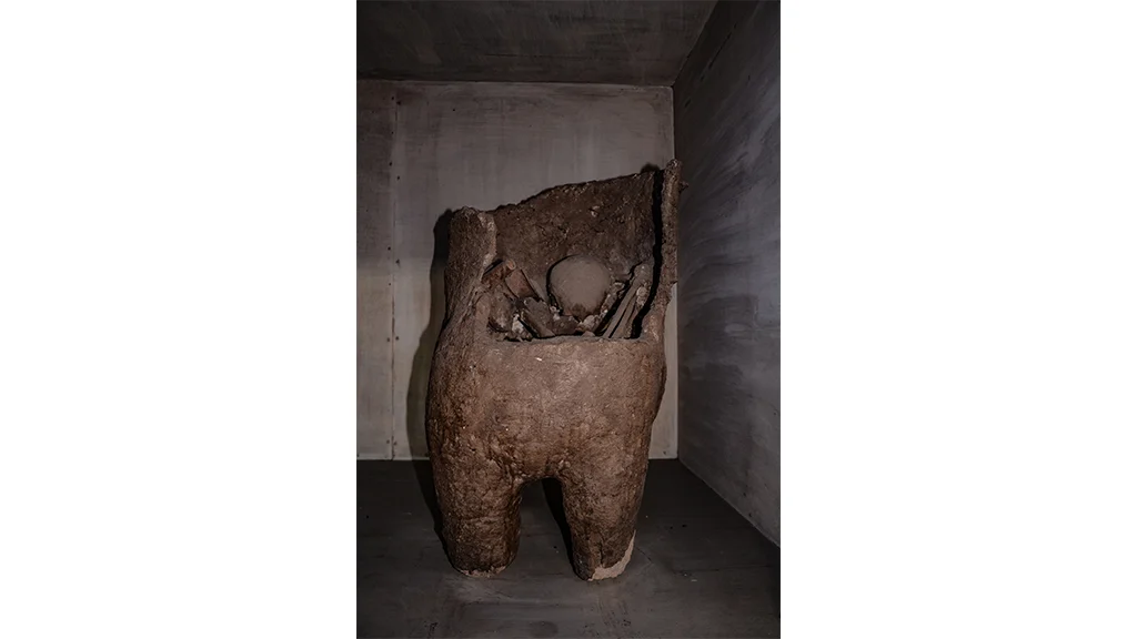 Urn Burial with the 35-year old inserted in it along with grave goods such as vessels