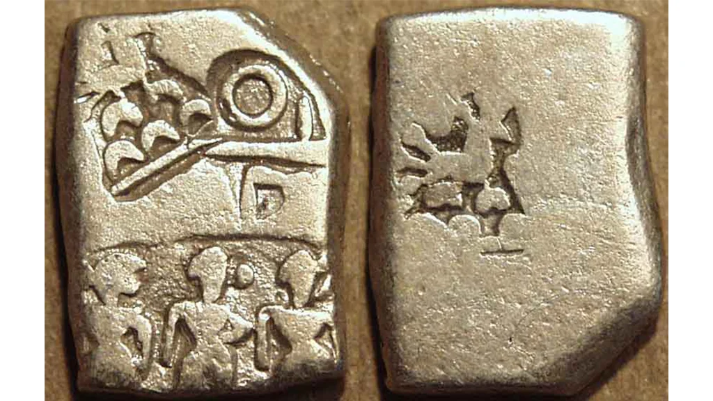 Rectangular coin chipped from one side to adjust the weight 