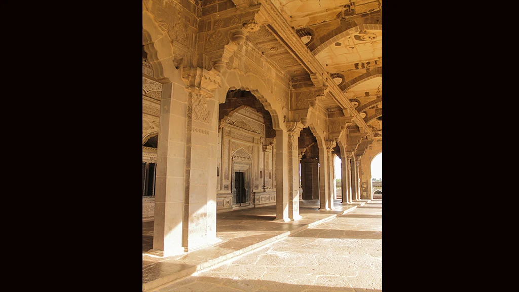 Through the ornate arcades, we reached the inner room of the tomb stones.