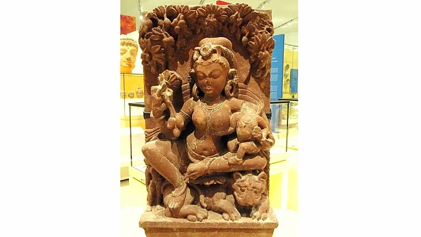 Sculpture of Ambika sitting under a mango tree